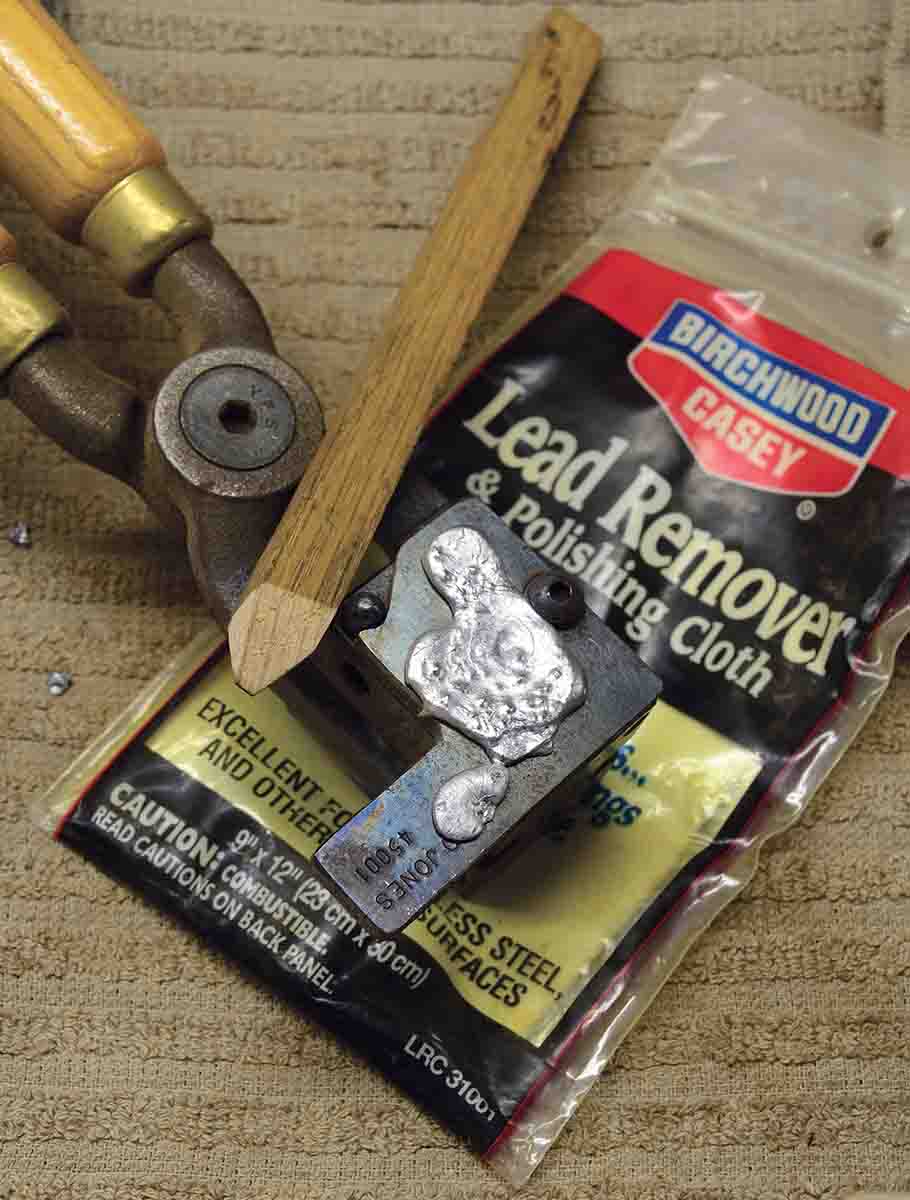 Birchwood Casey lead remover cloth and a sharp wooden stick.